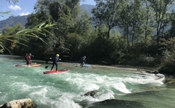 Wild South SUP // Wildwasser SUP & Packraft Schule mit Verleih